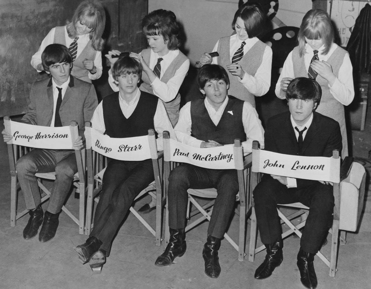 A photo of the Beatles on the set of 'A Hard Day's Night' in 1964. Original source: Grammy Awards, www.grammy.com/news/the-beatles-a-hard-days-night-album-soundtrack-influence